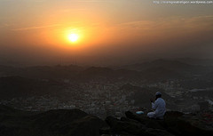 A Muslim pilgrim prays near where the Hiraa cave is located, at the top of Noor Mountain on the outskirts of Mecca, Saudi Arabia, Tuesday, Nov. 24, 2009. According to tradition, Islam's Prophet Mohammed received his first message to preach Islam while he was praying in the cave.