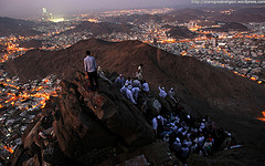 Muslim pilgrims pray on atop Noor Mountain in the holy city of Mecca before the start of the annual hajj pilgrimage, on November 23, 2009. 