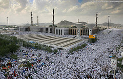 Muslim pilgrims pray outside Namira mosque in Arafat near Mecca ,Saudi Arabia, Thursday, Nov. 26, 2009.