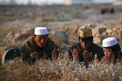 Muslims pray during Eid al-Adha celebrations in Wuzhong, Ningxia Hui Autonomous Region, China on November 27, 2009.
